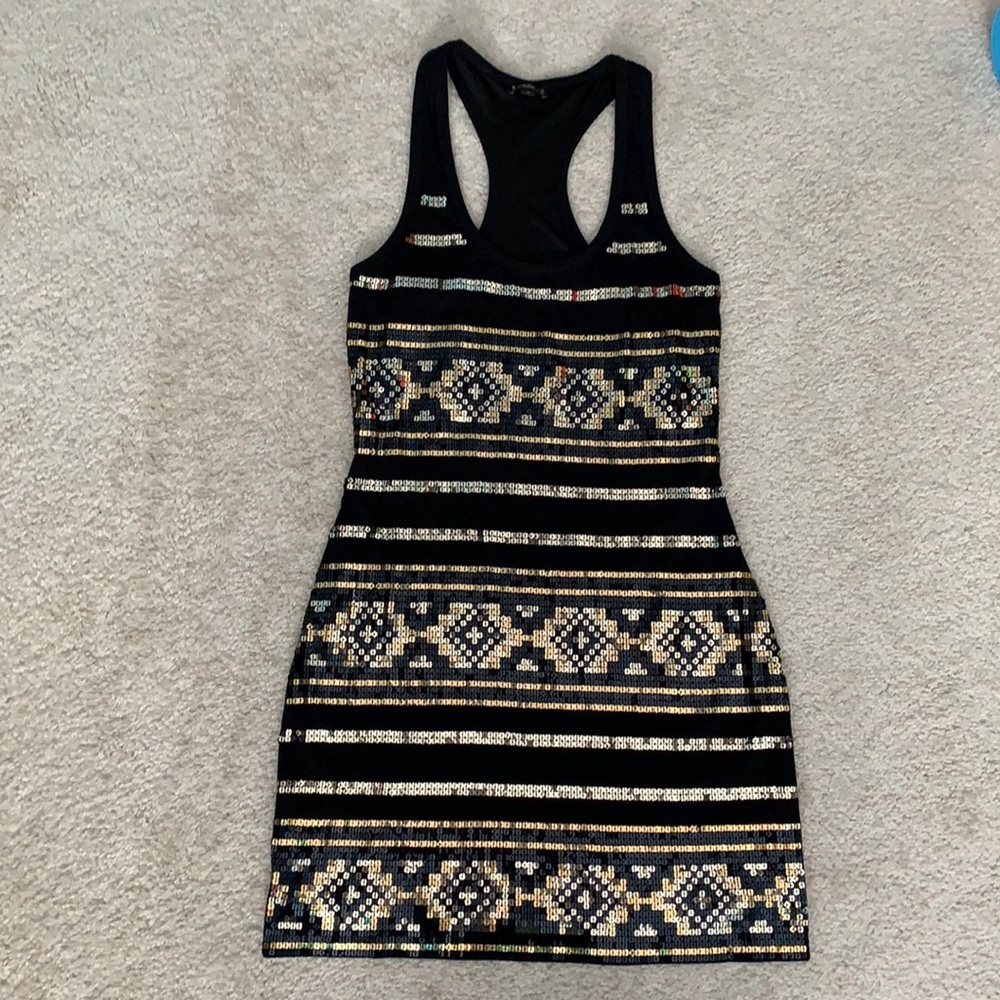 Black racerback dress with gold sequins